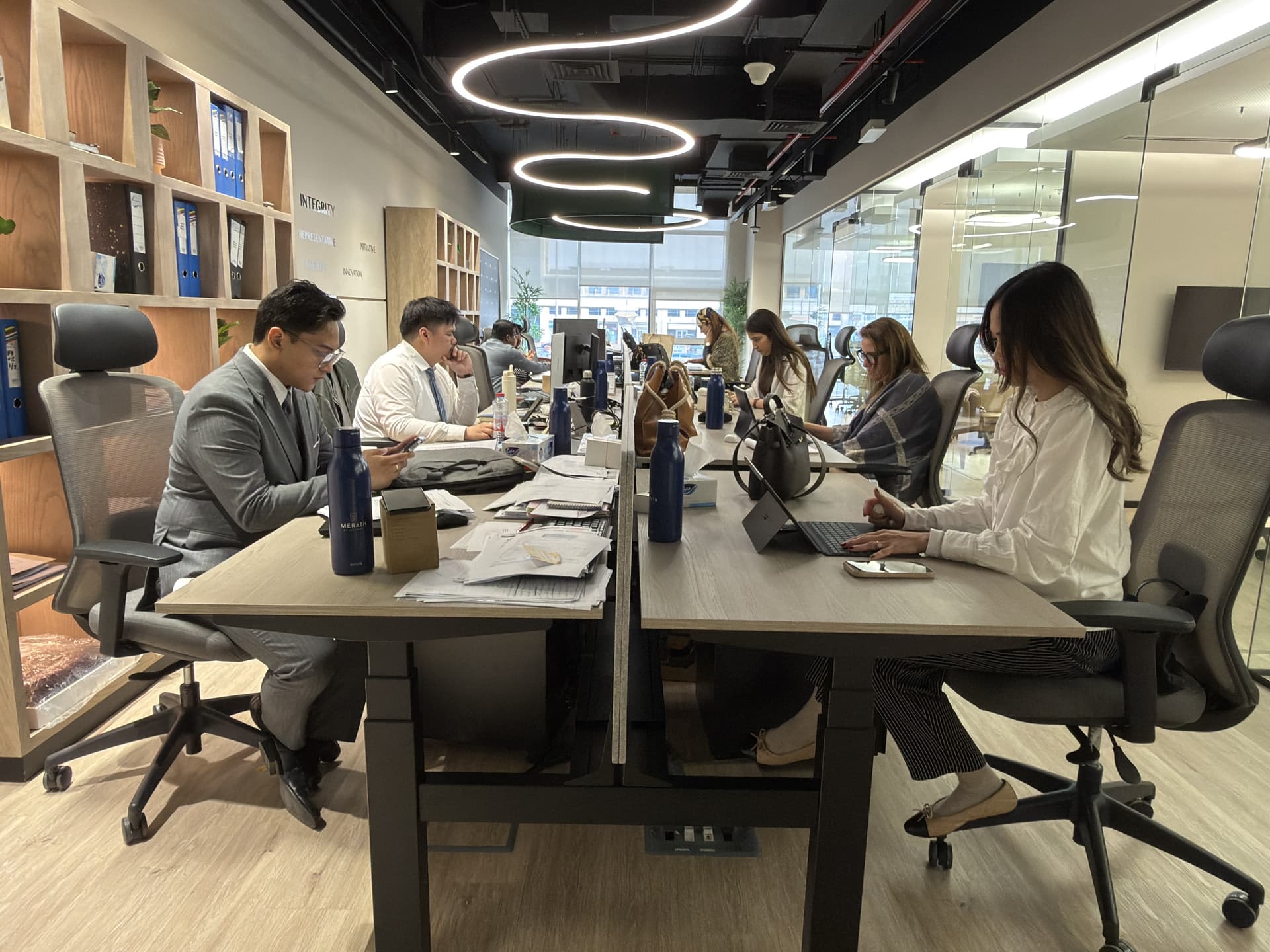 Modern office workspace with professionals